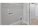 Convenient laundry area with hookups and shelving at 71 Macy Cir, Wendell, NC 27591