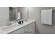 Clean bathroom with double vanity and updated fixtures at 71 Macy Cir, Wendell, NC 27591