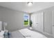 Serene bedroom with window view and ample closet space at 71 Macy Cir, Wendell, NC 27591