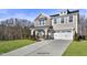 Two-story home with stone accents and landscaping at 71 Macy Cir, Wendell, NC 27591