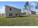 House with backyard, sliding glass doors, and grassy area at 210 Bay Laurel Dr, Sanford, NC 27332