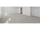 Spacious primary bedroom with window and access to bathroom at 210 Bay Laurel Dr, Sanford, NC 27332