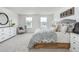 Spacious main bedroom with a king-size bed and two nightstands at 311 Leven Dr, Gibsonville, NC 27249