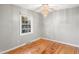 Bedroom with hardwood floors and a ceiling fan at 110 Starlite Dr, Carrboro, NC 27510