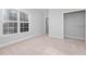 Bedroom with closet and large window at 3007 Olde Weatherstone Way, Cary, NC 27513