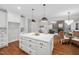 Open concept kitchen with island and breakfast area at 3007 Olde Weatherstone Way, Cary, NC 27513