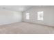 Bright bedroom with neutral carpeting and vaulted ceilings at 317 Leven Dr, Gibsonville, NC 27249