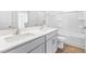 Bathroom with double vanity and shower/tub combo at 317 Leven Dr, Gibsonville, NC 27249