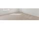 Bright bedroom with carpeted floor and window at 317 Leven Dr, Gibsonville, NC 27249