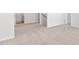 Carpeted hallway with access to bedrooms and bathroom at 317 Leven Dr, Gibsonville, NC 27249
