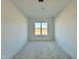 Spacious bedroom with large window and ample natural light at 103 S Stone Mill W Trl # 237, Clayton, NC 27520