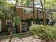 Brick building exterior with lush landscaping at 3736 Jamestown Cir, Raleigh, NC 27609