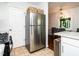 Stainless steel refrigerator in the kitchen at 3736 Jamestown Cir, Raleigh, NC 27609