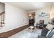 Living room with hardwood floors and a view of the dining area at 3736 Jamestown Cir, Raleigh, NC 27609