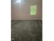 Bedroom with gray carpeting and window at 1111 Nottingham Cir, Cary, NC 27511