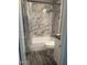 Updated bathroom with a walk-in shower and modern vanity at 1111 Nottingham Cir, Cary, NC 27511