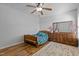 Bright bedroom with wood flooring and ample closet space at 2125 Star Sapphire Dr, Raleigh, NC 27610