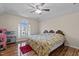 Large bedroom with king-size bed and plenty of natural light at 2125 Star Sapphire Dr, Raleigh, NC 27610