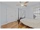 Bedroom with wood flooring and a four-poster bed at 2125 Star Sapphire Dr, Raleigh, NC 27610