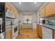 Well-equipped kitchen with granite counters and hardwood floors at 2125 Star Sapphire Dr, Raleigh, NC 27610