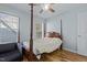 Spacious bedroom with wood flooring and large windows at 2125 Star Sapphire Dr, Raleigh, NC 27610