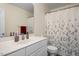 Simple bathroom with a shower/tub combo and vanity at 115 Carrington Ave, Franklinton, NC 27525