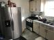 Kitchen with stainless steel appliances and wood cabinets at 308 E East End Ave, Durham, NC 27703
