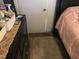 Bedroom with pink bedding, dresser, and small rug at 308 E East End Ave, Durham, NC 27703