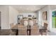 Modern kitchen with white cabinets, stainless steel appliances, and an island at 6429 Alfalfa Ln, Wake Forest, NC 27587