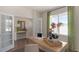 Bright home office features built-in desk, French doors, and large window at 6429 Alfalfa Ln, Wake Forest, NC 27587