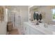 Double vanity bathroom with a large walk-in shower at 6429 Alfalfa Ln, Wake Forest, NC 27587