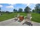 Spacious backyard with two chairs and a wooden table at 6429 Alfalfa Ln, Wake Forest, NC 27587