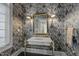 Elegant powder room with marble vanity and decorative wallpaper at 90118 Hoey, Chapel Hill, NC 27517