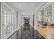 Elegant marble hallway with high ceilings and access to multiple rooms at 90118 Hoey, Chapel Hill, NC 27517