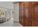 Bright hallway with built-in storage and view into adjacent room at 90118 Hoey, Chapel Hill, NC 27517
