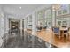 Bright dining room with hardwood floors and large windows offering scenic views at 90118 Hoey, Chapel Hill, NC 27517