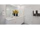 Double vanity bathroom with shower and storage at 316 Leven Dr, Gibsonville, NC 27249