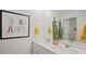 Double vanity bathroom with a large mirror and modern design at 316 Leven Dr, Gibsonville, NC 27249