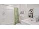 Clean bathroom with tub shower combination and modern vanity at 316 Leven Dr, Gibsonville, NC 27249