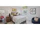 Bedroom with a bed, window, and a beanbag chair at 316 Leven Dr, Gibsonville, NC 27249