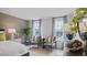 Bedroom with two armchairs and large windows at 316 Leven Dr, Gibsonville, NC 27249