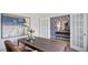 Bright home office with wood desk, double doors, and accent wall at 316 Leven Dr, Gibsonville, NC 27249
