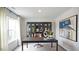 Functional home office with large desk and built in shelving at 316 Leven Dr, Gibsonville, NC 27249