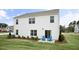 Two-story house with white siding and backyard at 316 Leven Dr, Gibsonville, NC 27249