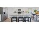 Modern kitchen with granite island and stainless steel appliances at 316 Leven Dr, Gibsonville, NC 27249