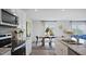 Modern kitchen with granite counters and breakfast nook at 316 Leven Dr, Gibsonville, NC 27249