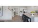Open concept kitchen with island and stainless steel appliances at 316 Leven Dr, Gibsonville, NC 27249