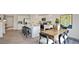 Open concept kitchen and dining area with island, stainless steel appliances, and hardwood floors at 316 Leven Dr, Gibsonville, NC 27249