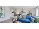 Spacious living room with comfortable seating and view into kitchen at 316 Leven Dr, Gibsonville, NC 27249