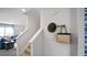 Modern white staircase leading to upper level at 316 Leven Dr, Gibsonville, NC 27249